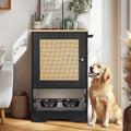 Black and vintage dog feeding cabinet with a pull-out tray of stainless bowls