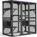 Black walk-in catio enclosure with tarp roof on a garden patio
